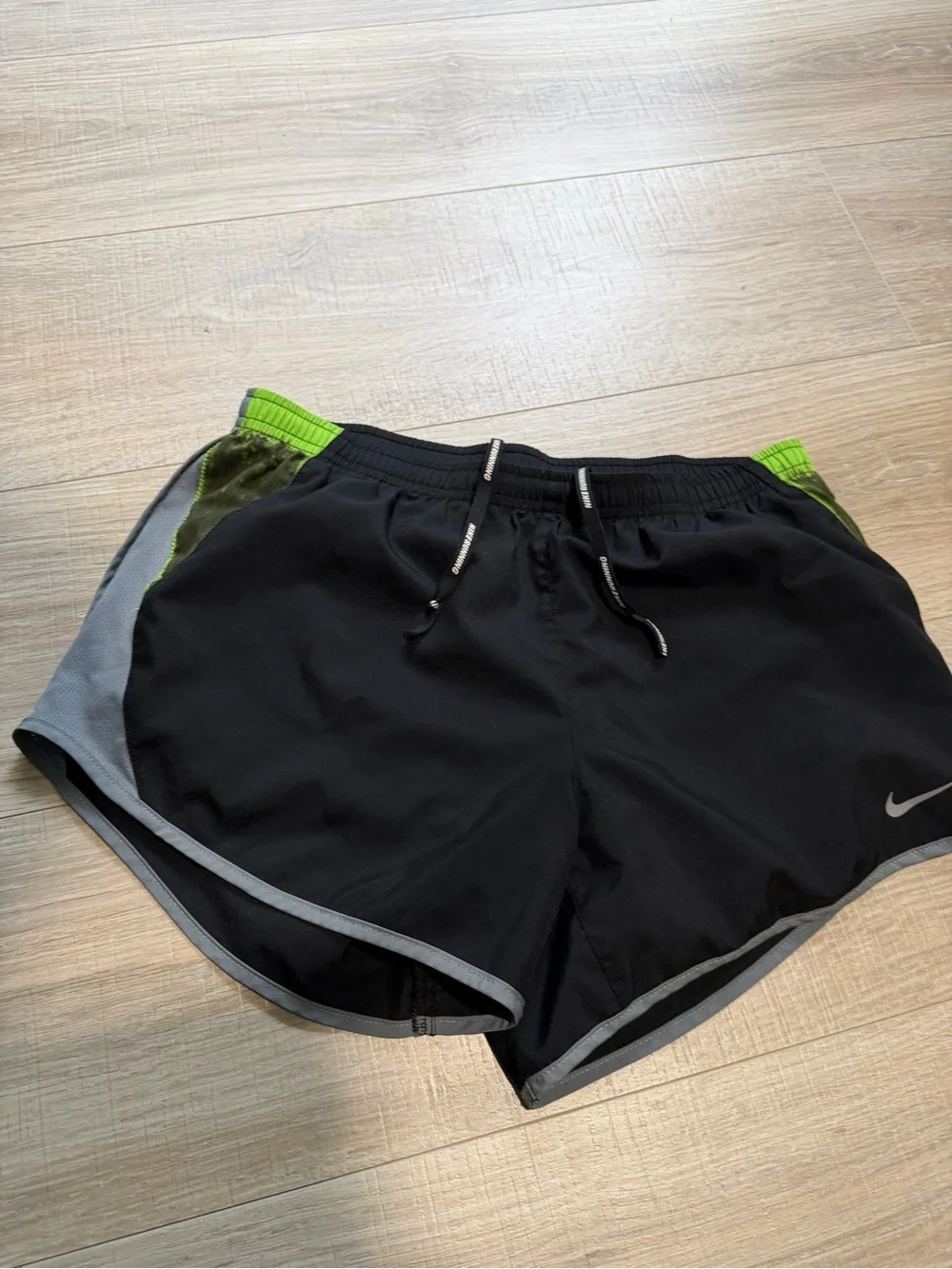 Nike woman’s Black & Green Running Shorts
